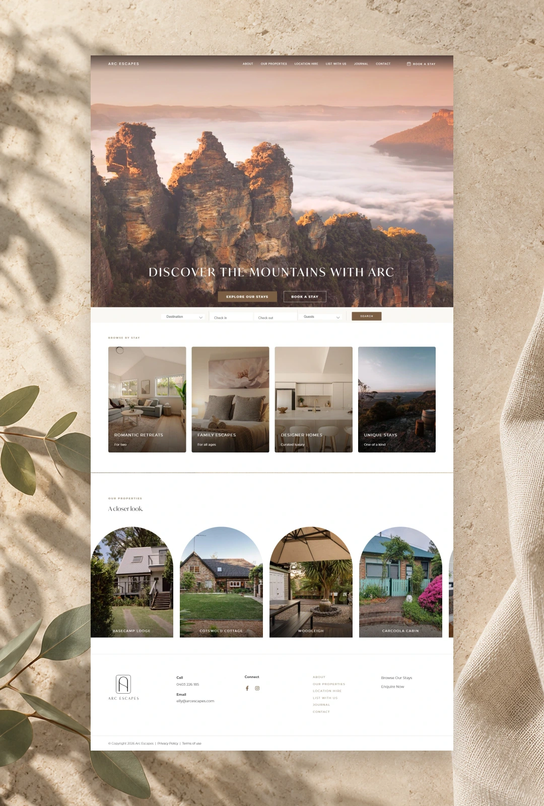 ARC Escapes original website and footer on a stone and eucalyptus backdrop