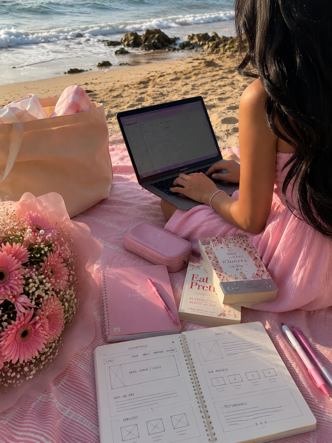 Bright workspace with laptop and pink tulips